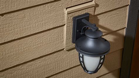 Then you can go between the ribs. . Light fixture mounting block for metal siding